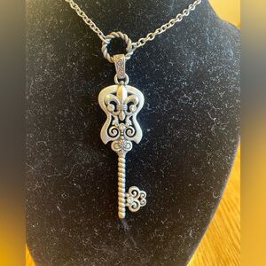 Hard Rock Intricate Silver Guitar Key Necklace.